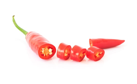 Red hot chilli pepper and slice on white background, raw material for make cooking