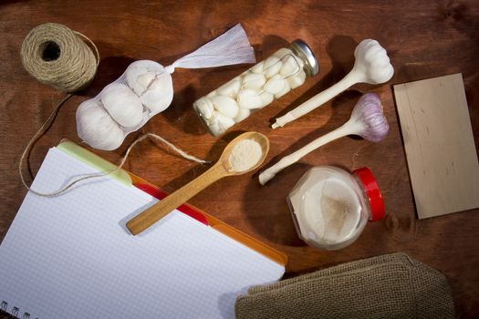 Varied garlic package on a wooden background