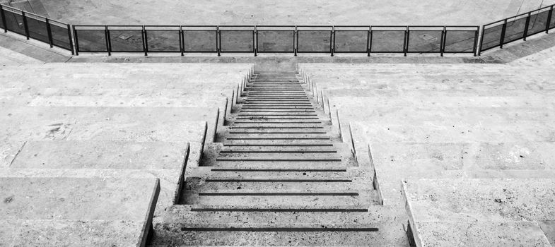 black and white stairs in a stadium