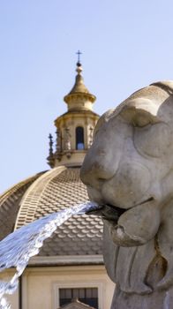 Lions fountain in Piazza del Popolo, Rome, Italy