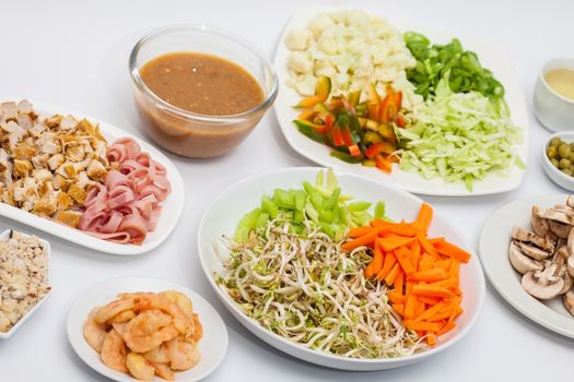 Sauteed vegetables with chicken, pork, jam and shrimps preparation : Chopped vegetables and meats