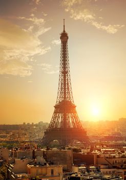 Parisian cityscape with the view on Eiffel Tower at sunset, France