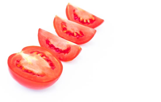 Closeup fresh red tomatoes slice on white background, food and vegetable