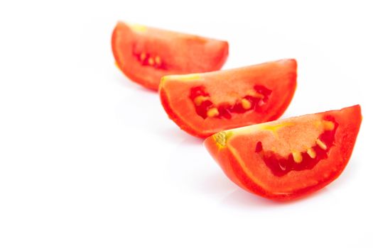 Closeup fresh red tomatoes on white background, food and vegetable concept