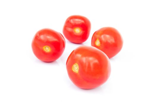 Closeup fresh red tomatoes on white background, food and vegetable concept