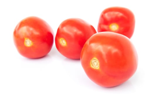 Closeup fresh red tomatoes on white background, food and vegetable concept