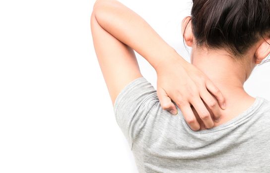 Woman Itching on shoulder with white background for healthy concept