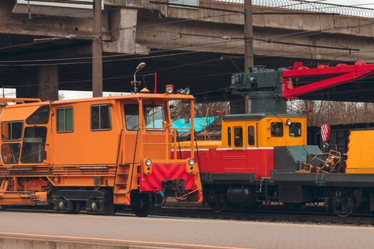 Ballast distributing and profiling track machine. Repair train