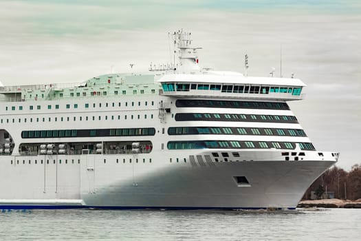 White cruise liner sailing on a clear day