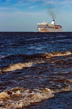 White cruise liner sailing on a clear day