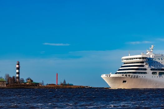 White cruise liner sailing on a clear day