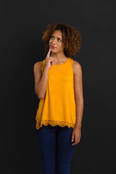 Beautiful African American woman with a thinking expression