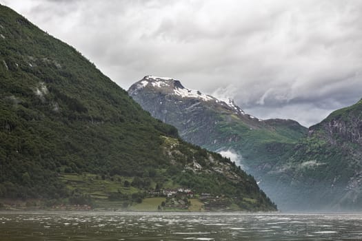 Mountains in Geiranger in a cloudy day, Norway