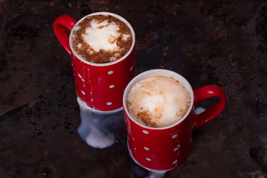 Two coffee cups for lovers prepare for morning coffee with copy blank space for writing on rustic grunge background