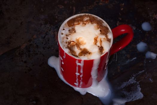 Hot chocolate with marshmallows on grunge dark table