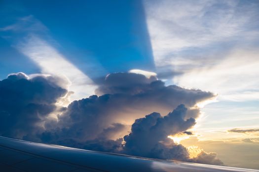 beautiful sunray with blue sky  view from airplane window