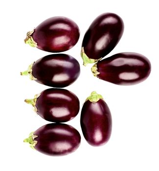 Arrangement of Raw Small Eggplants isolated on White background. Top View