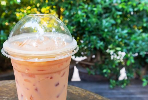 Closeup Ice of thai milk tea milk with nature background