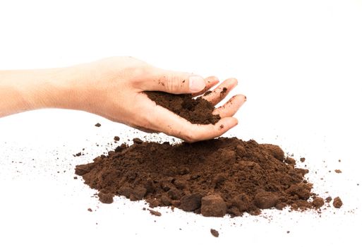Hand hold coffee ground on white background, skin care and beauty concept