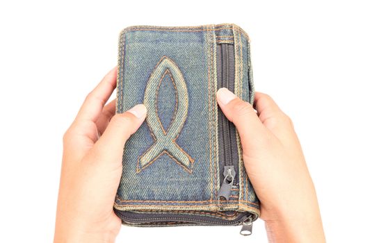 Woman hands praying and hold bible on white background, religion concept