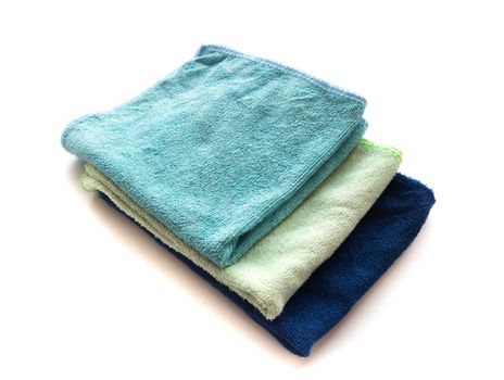 Pile of microfiber cloth for clean on white background, workhouse concept
