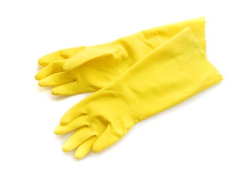 Yellow rubber gloves for cleaning on white background, workhouse concept