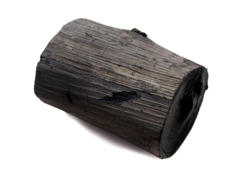 black charcoal on white background, raw material for make cooking