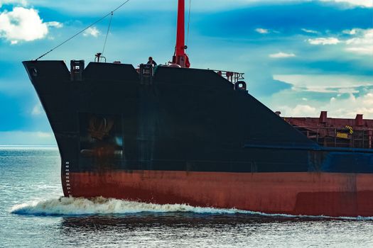 Black bulk carrier sailing from the Baltic sea