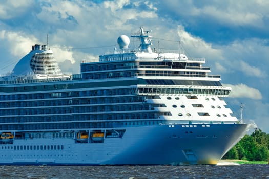 Big white cruise ship sailing to the Baltic sea at clear day