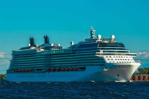 Big white cruise ship sailing to the Baltic sea at clear day