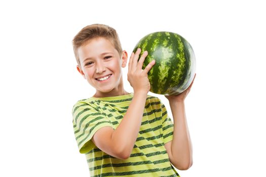 Handsome smiling child boy hand holding green ripe watermelon fruit food white isolated