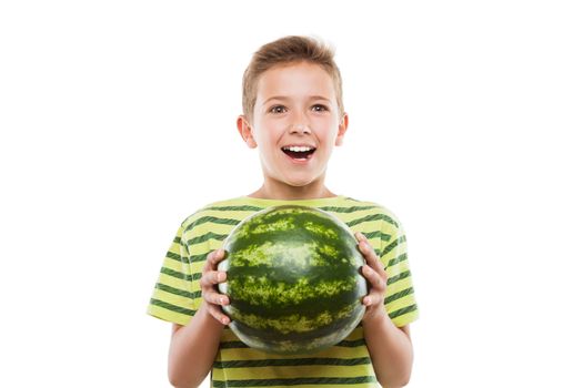 Handsome smiling child boy hand holding green ripe watermelon fruit food white isolated
