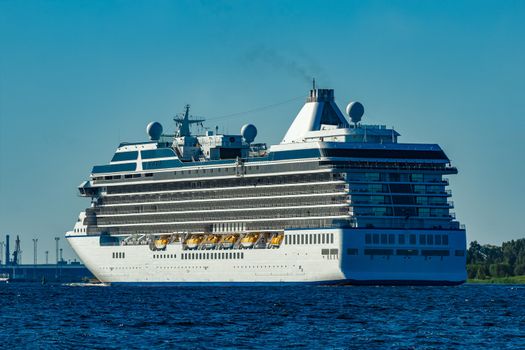 Big white cruise ship sailing to the Baltic sea at clear day