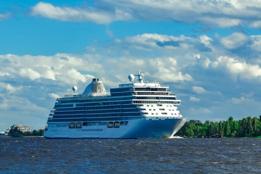 Big white cruise ship sailing to the Baltic sea at clear day