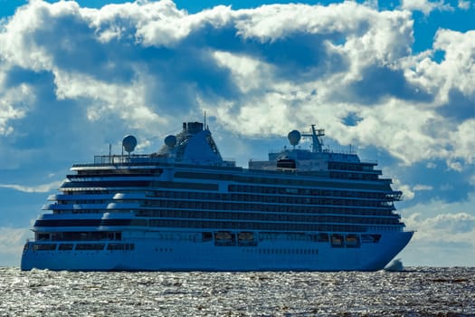 Big white cruise ship sailing to the Baltic sea at clear day