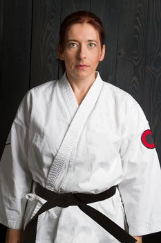 forty year old woman wearing karate gi