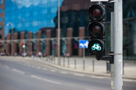 Bicycle traffic light bright green light close up