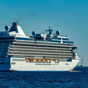 Big white cruise ship sailing to the Baltic sea at clear day