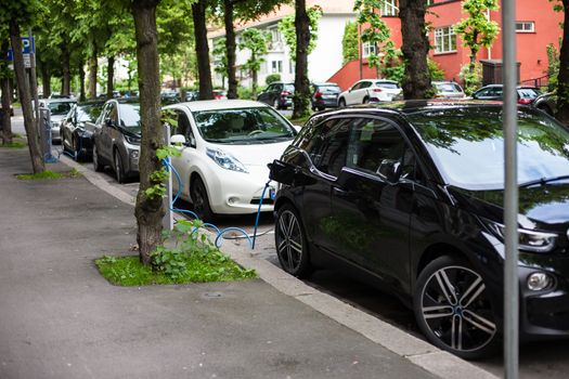 Electric car charging station in Oslo. Eco automobile that sparked a revolution