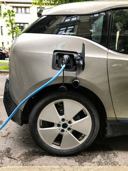 Electric car charging station in Oslo. Eco automobile that sparked a revolution