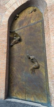 Statues on the door of the Basilica of St. Mary of the Angels and the Martyrs. The basilica is dedicated to the Christian martyrs, known and unknown.