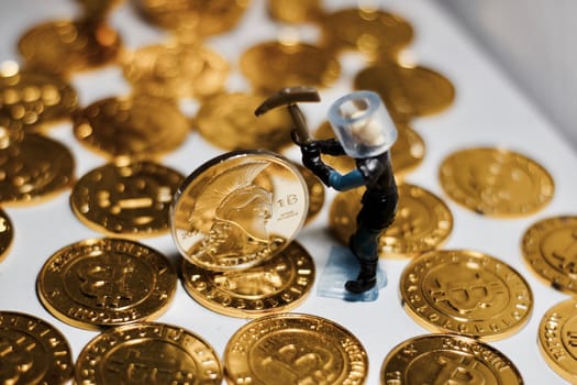 Digital currency physical metal bitcoin coin. Business mining concept.