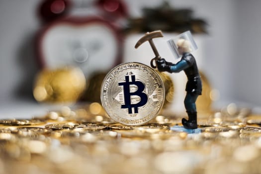 Digital currency physical metal bitcoin coin. Business mining concept.