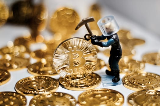 Digital currency physical metal bitcoin coin. Business mining concept.