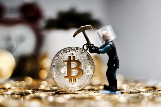 Digital currency physical metal bitcoin coin. Business mining concept.