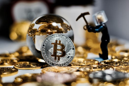 Digital currency physical metal bitcoin coin. Business mining concept.