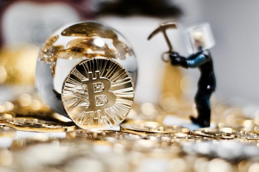 Digital currency physical metal bitcoin coin. Business mining concept.