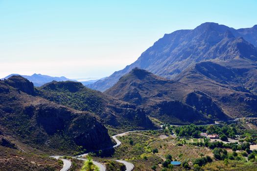 View of  Gran Canaria mountains valley with curvy road.