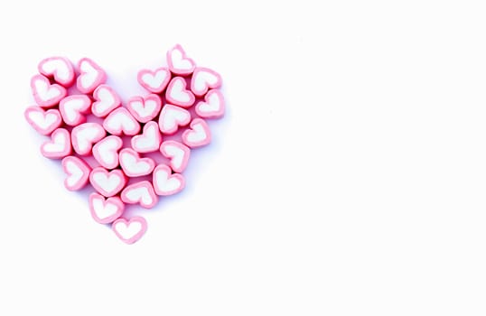 Pink sweet heart shape love marshmallow for love concept on white background