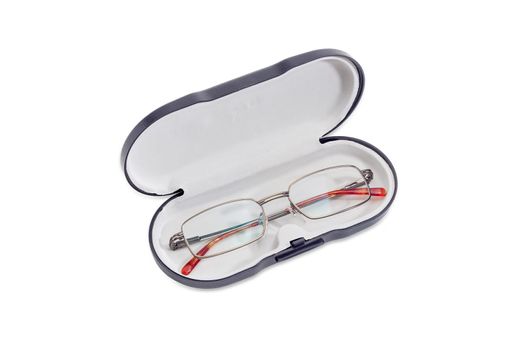 Modern pair of the classic men's eyeglasses in metal frame in hard spectacle-case on a white background
